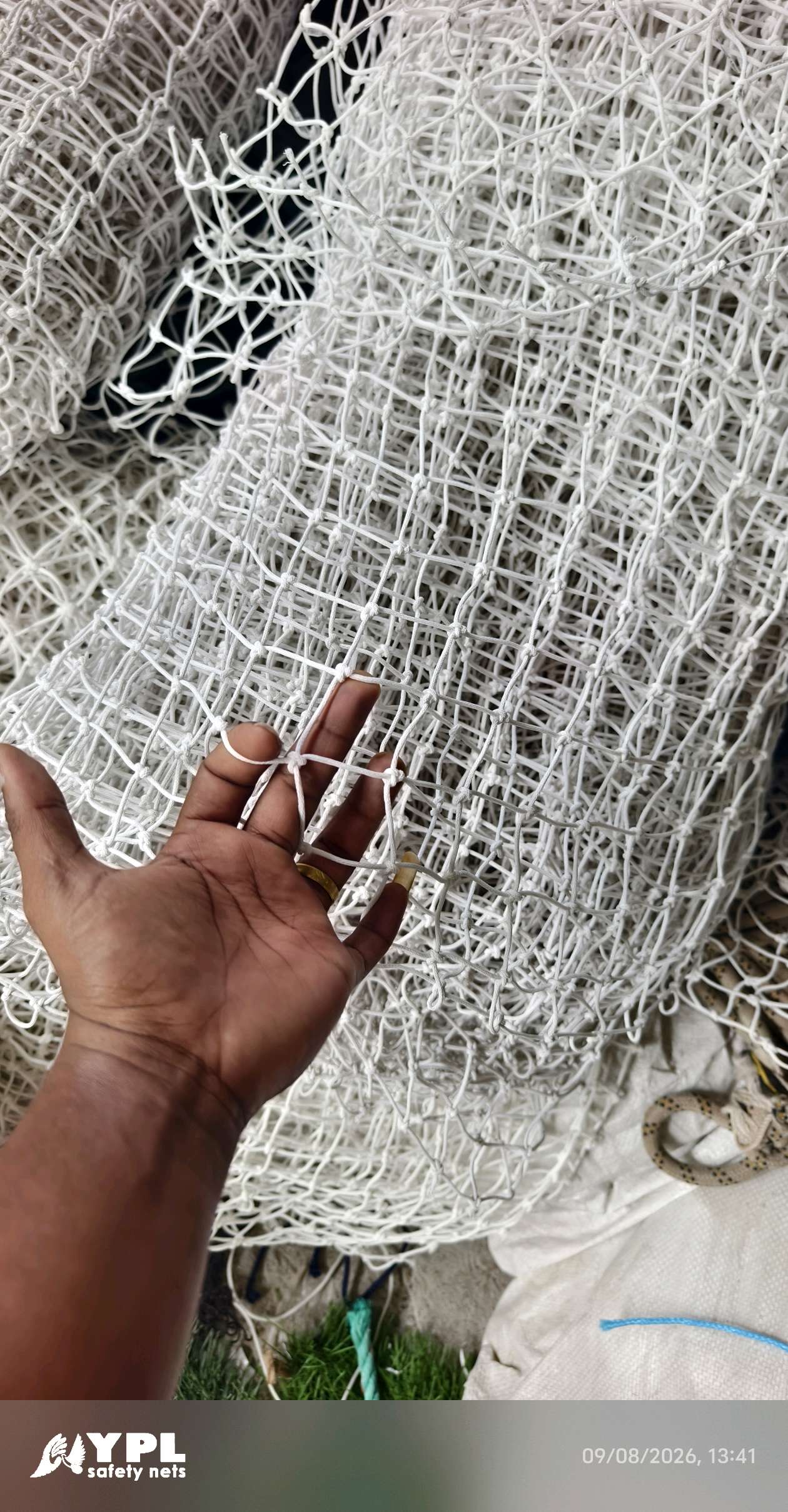 Industrial nylon net rolls stacked in the YPL Chennai stock room