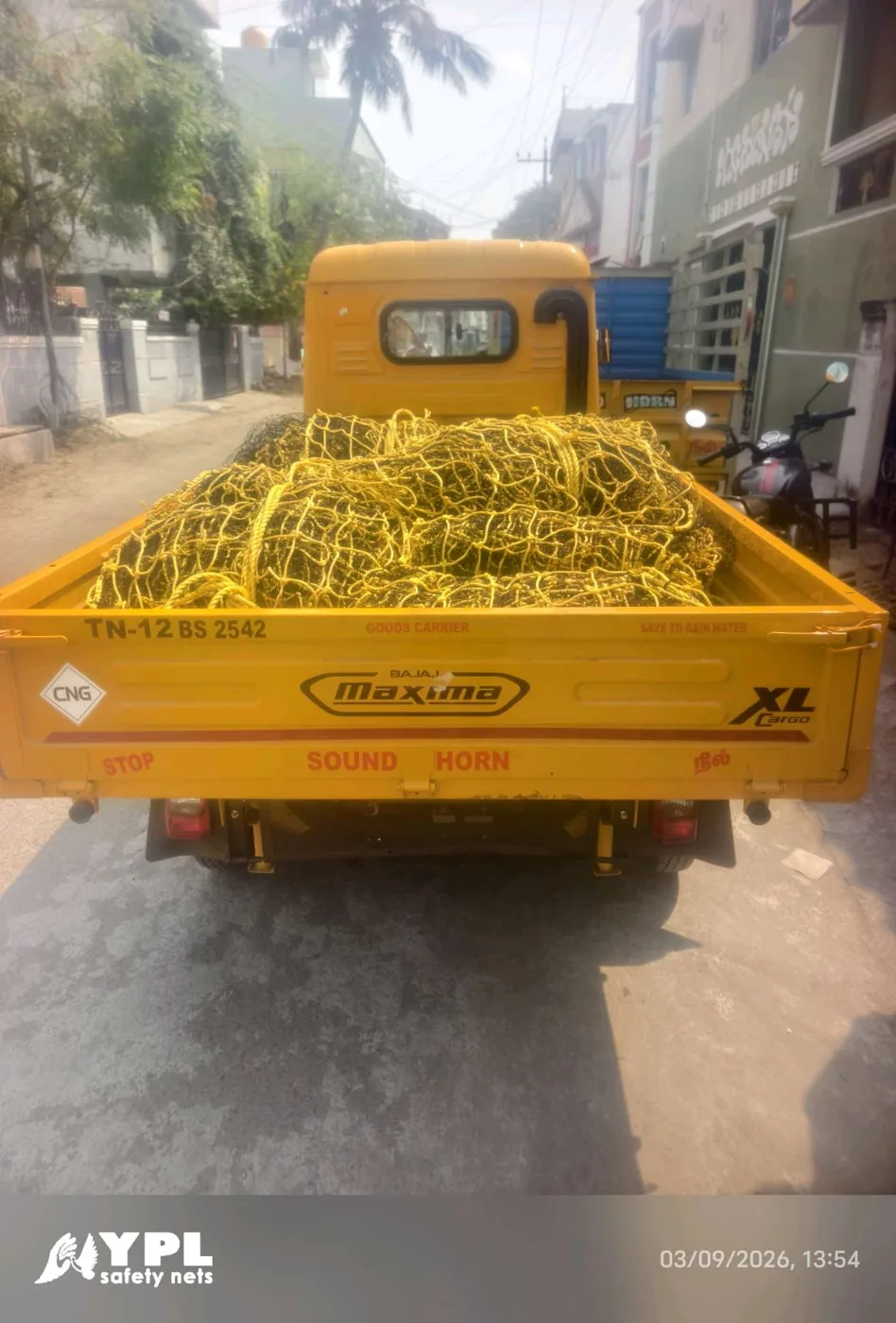 YPL Safety Nets delivery tempo carrying construction safety nets through Chennai to a building site