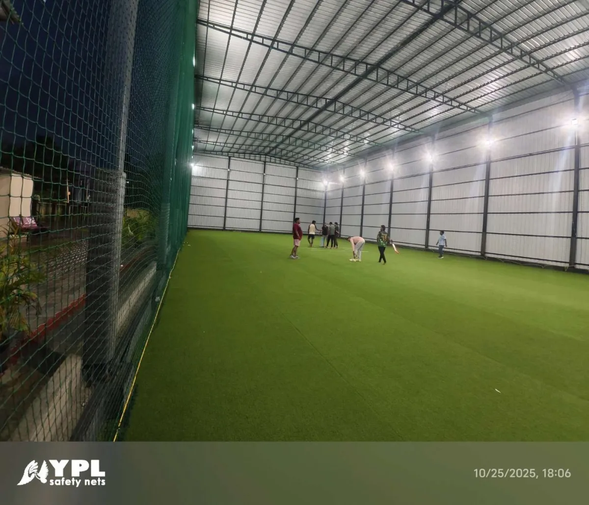 Indoor artificial turf arena with safety netting by YPL Safety Nets, serving Salem