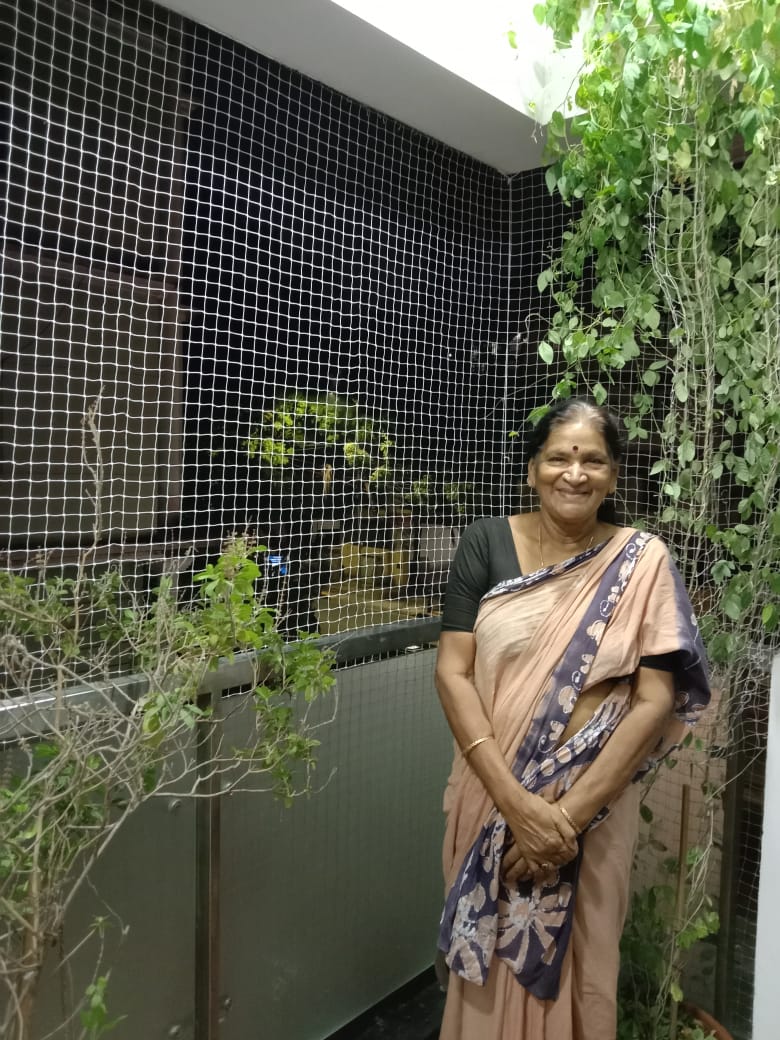 Black balcony safety net installed at a customer home garden sit-out in Chennai by YPL Safety Nets