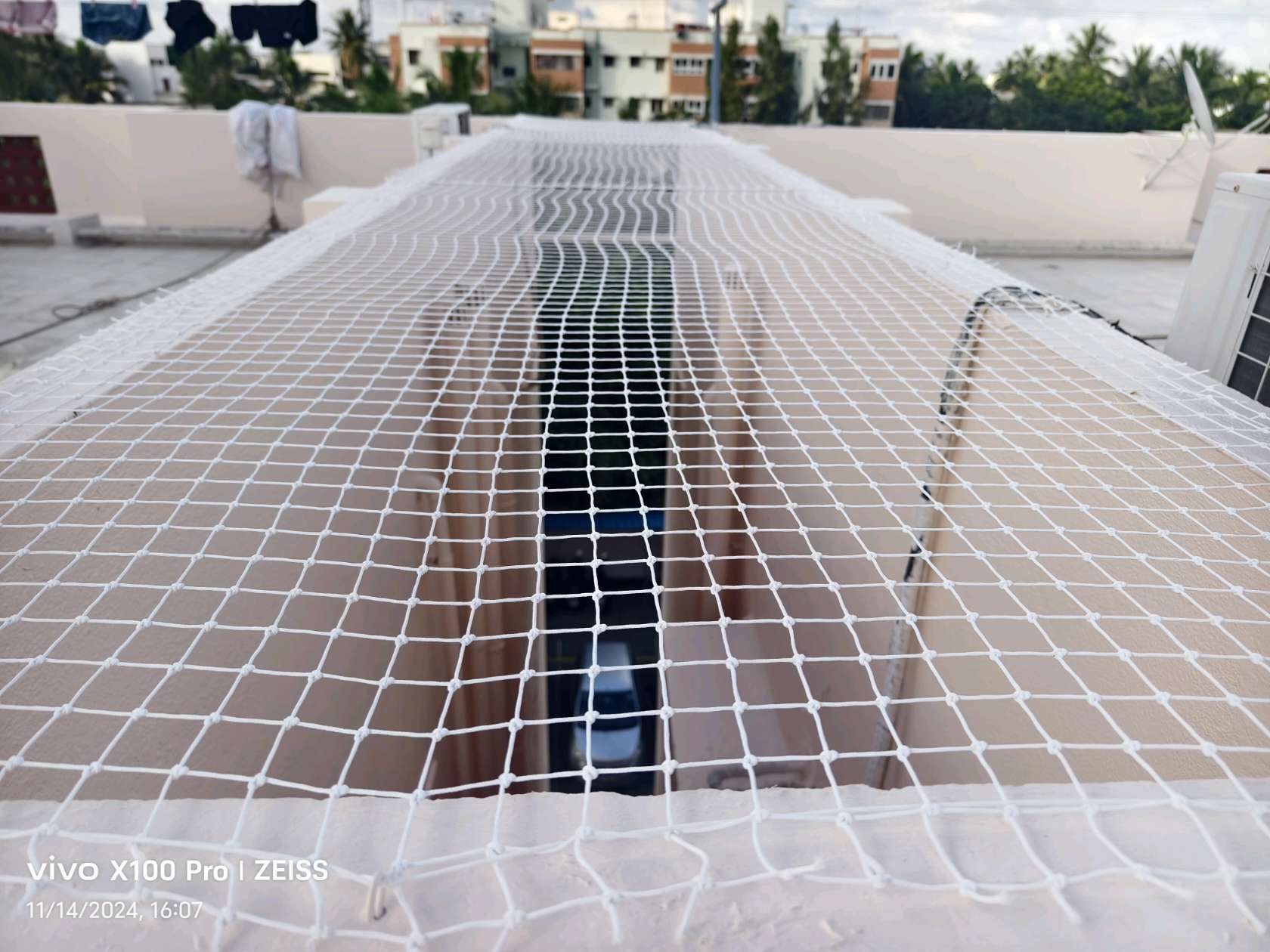 Terrace safety net secured across a wide opening for Monkey safety nets Chennai by YPL Safety Nets Chennai. Terrace safety net secured across a wide opening for Monkey safety nets Chennai by YPL Safety Nets Chennai.