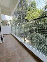 After: chew-resistant cat safety net fitted floor to ceiling on a Tambaram balcony by YPL Safety Nets