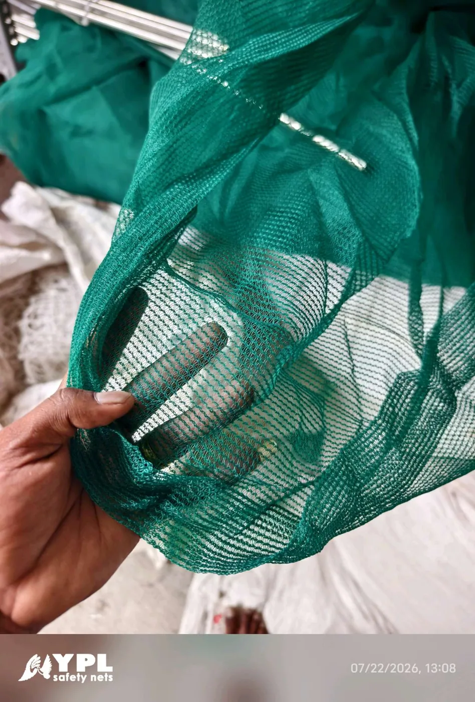 Monofilament construction safety net stock spread out at the YPL Safety Nets workshop in Pallikaranai Chennai