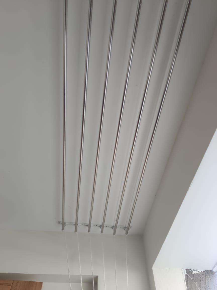 Installed ceiling clothes dryer with parallel stainless steel rods