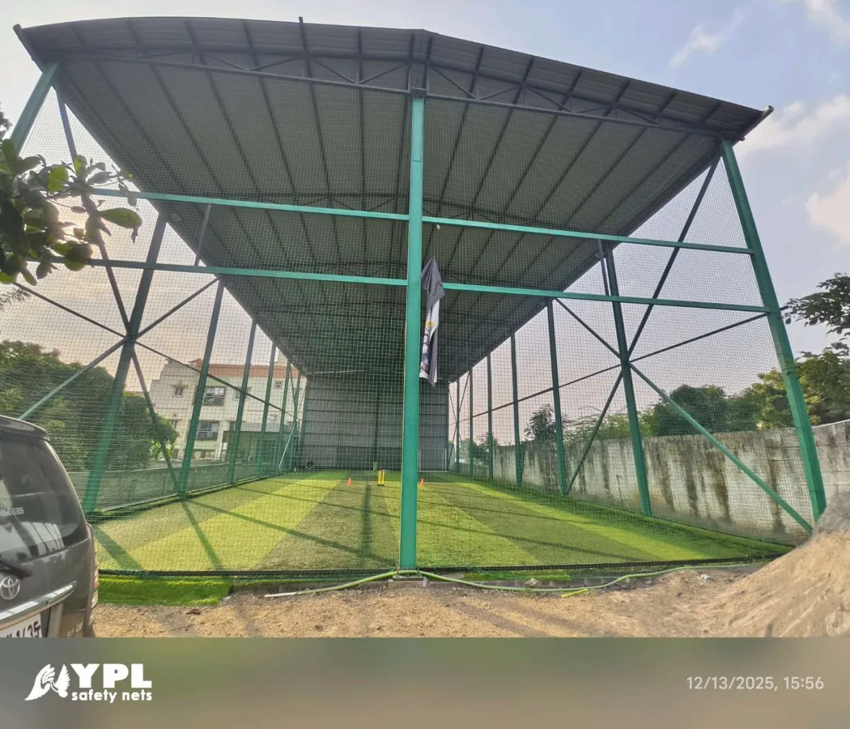 Outdoor cricket practice net cage with astro turf surface installed by YPL Safety Nets Tamil Nadu