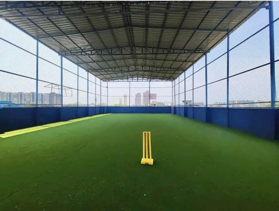 Indoor cricket practice box with astro turf lanes and netting by YPL Safety Nets