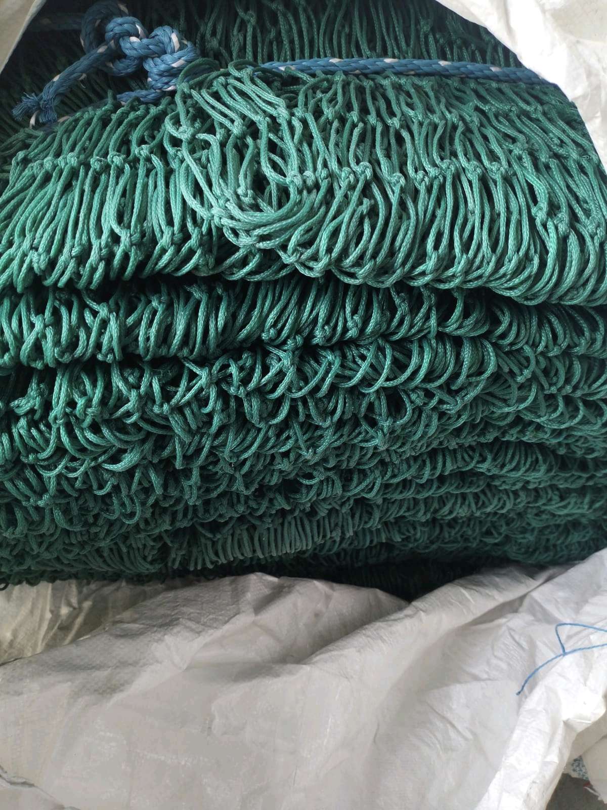 Packed heavy-duty green net ready for dispatch for Construction safety nets Chennai by YPL Safety Nets Chennai. Packed heavy-duty green net ready for dispatch for Construction safety nets Chennai by YPL Safety Nets Chennai.