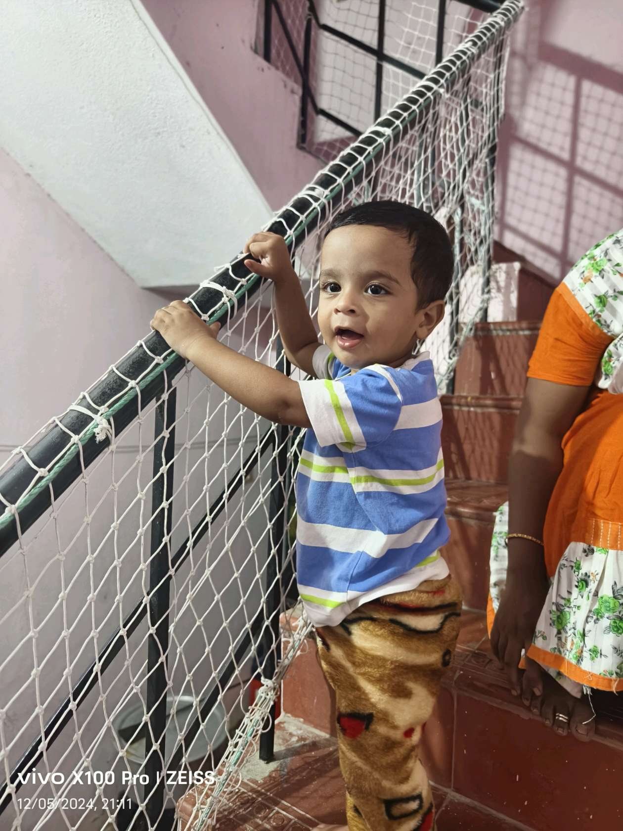 Child safety net for balcony protecting a toddler in a Chennai high-rise apartment — YPL Safety Nets