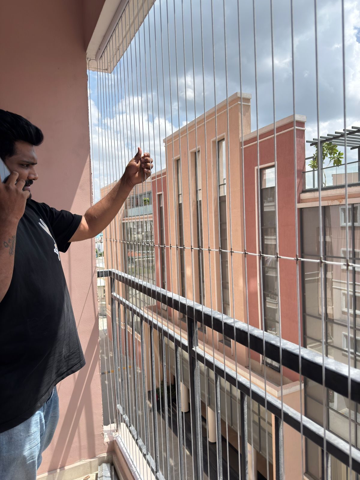 Corner balcony invisible grill installation in Chennai by YPL Safety Nets